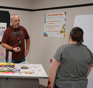 Instructors collaborating in the CSI d.Studio